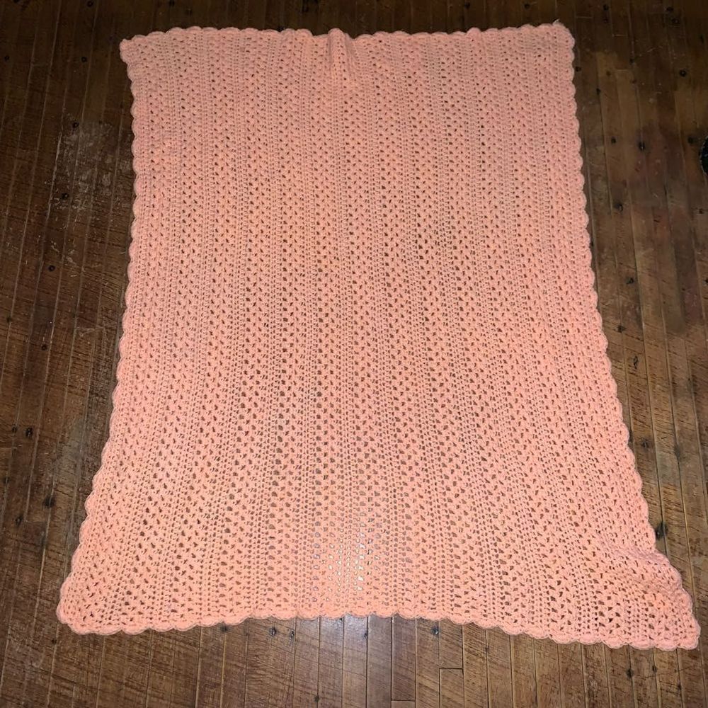 Handmade peach crocheted baby blanket